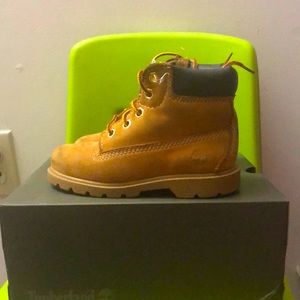 Worn twice. Toddlers timberlands ,comes with box